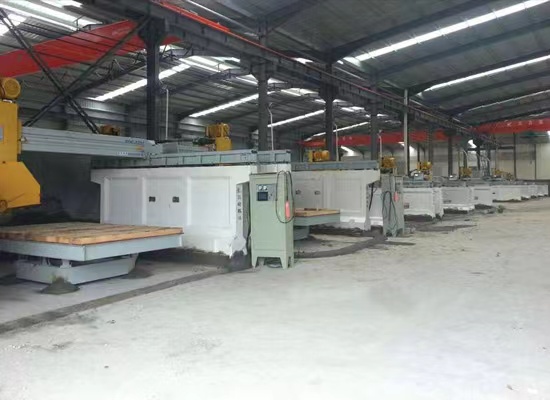 Stone cutting and polishing equipment at Phoenix Power Stone factory